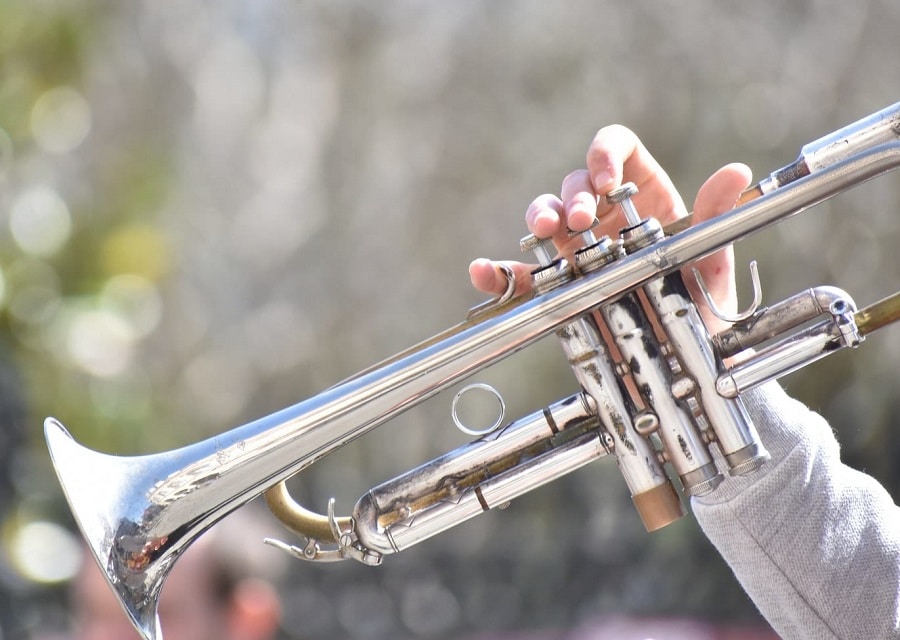 My first valve of my trumpet will not go all the way down, I can't take my  mouthpiece out, and I can't blow high notes through my trumpet. If anyone  knows what